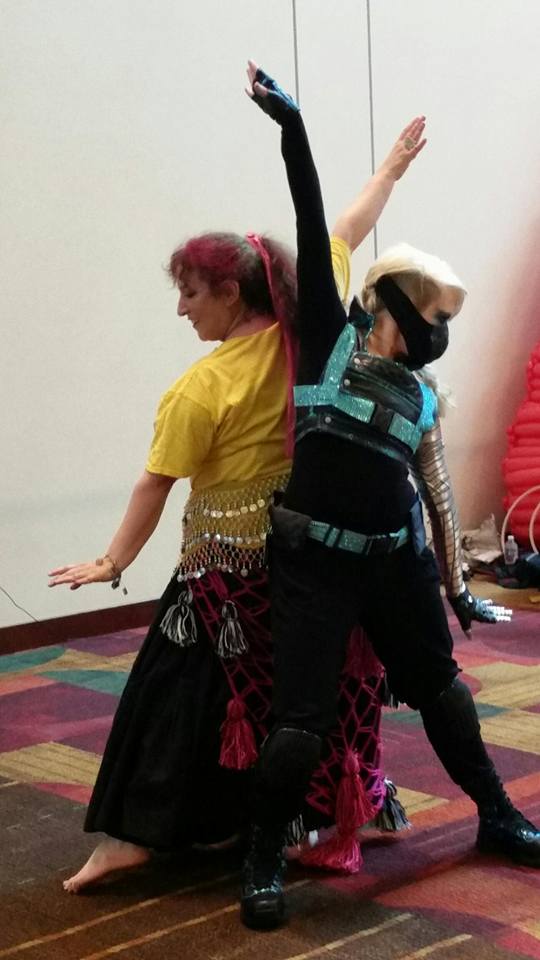 Margaret and Verna performing a duet at Gen Con 2014. Photo by Rebekah.