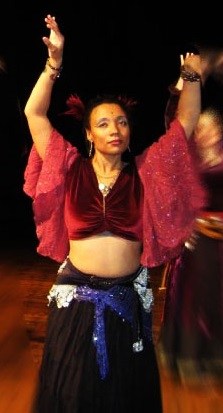 Photo of Laura dancing with retired group Calypso's Pearls. 