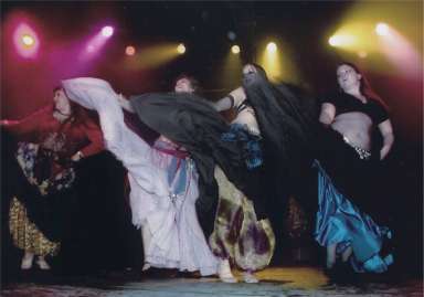 On stage for Stimuli 2003 at Axis in Bloomington, Indiana, with skirts FLYING!